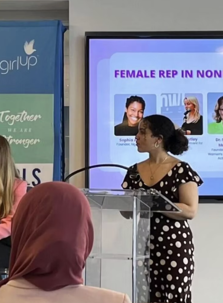 Maryam Bellakbira presenting at Girl Up speaking engagement