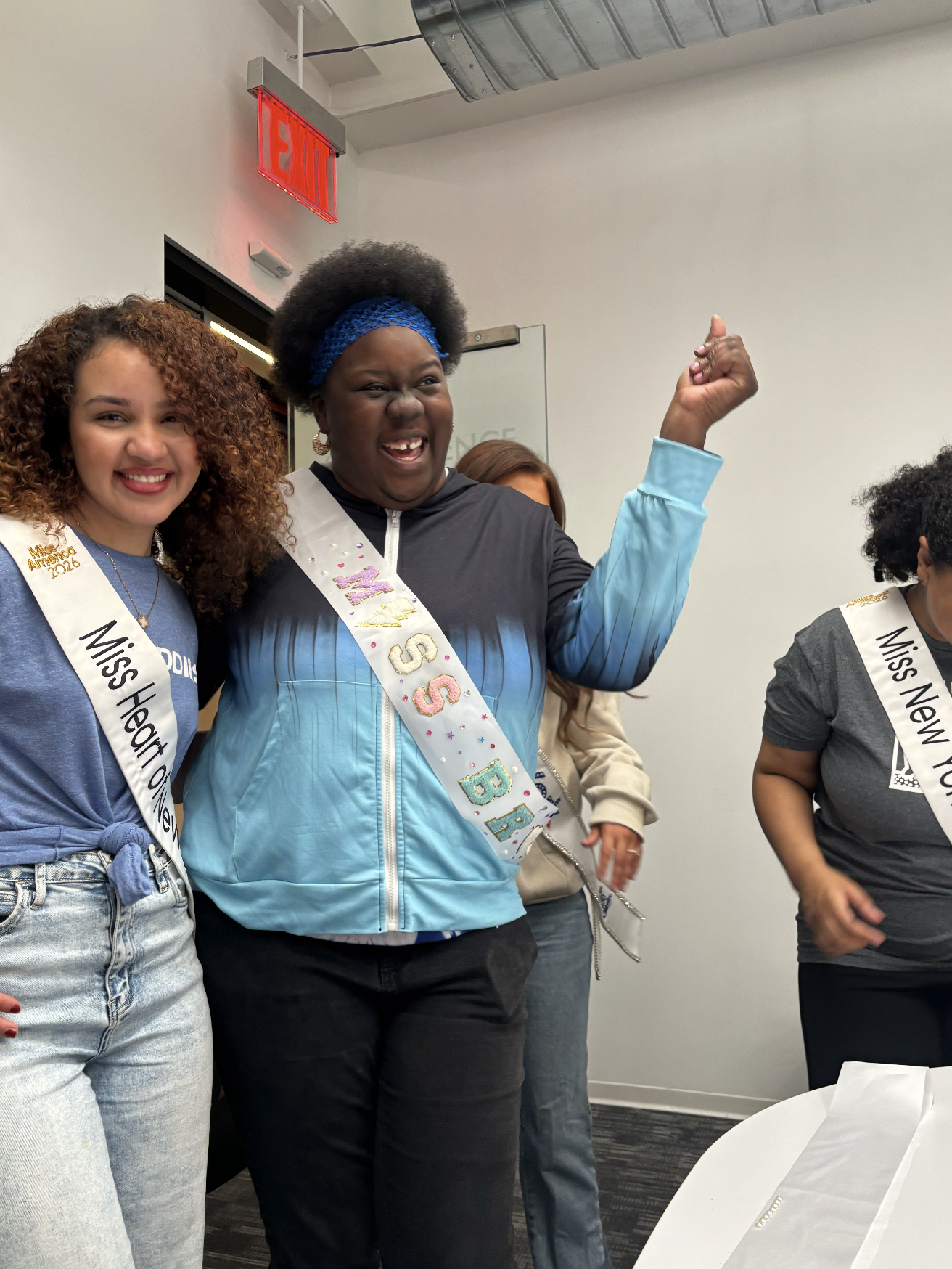 Mary Bellakbira with fellow Miss America contestants wearing their state sashes at a pageant appearance